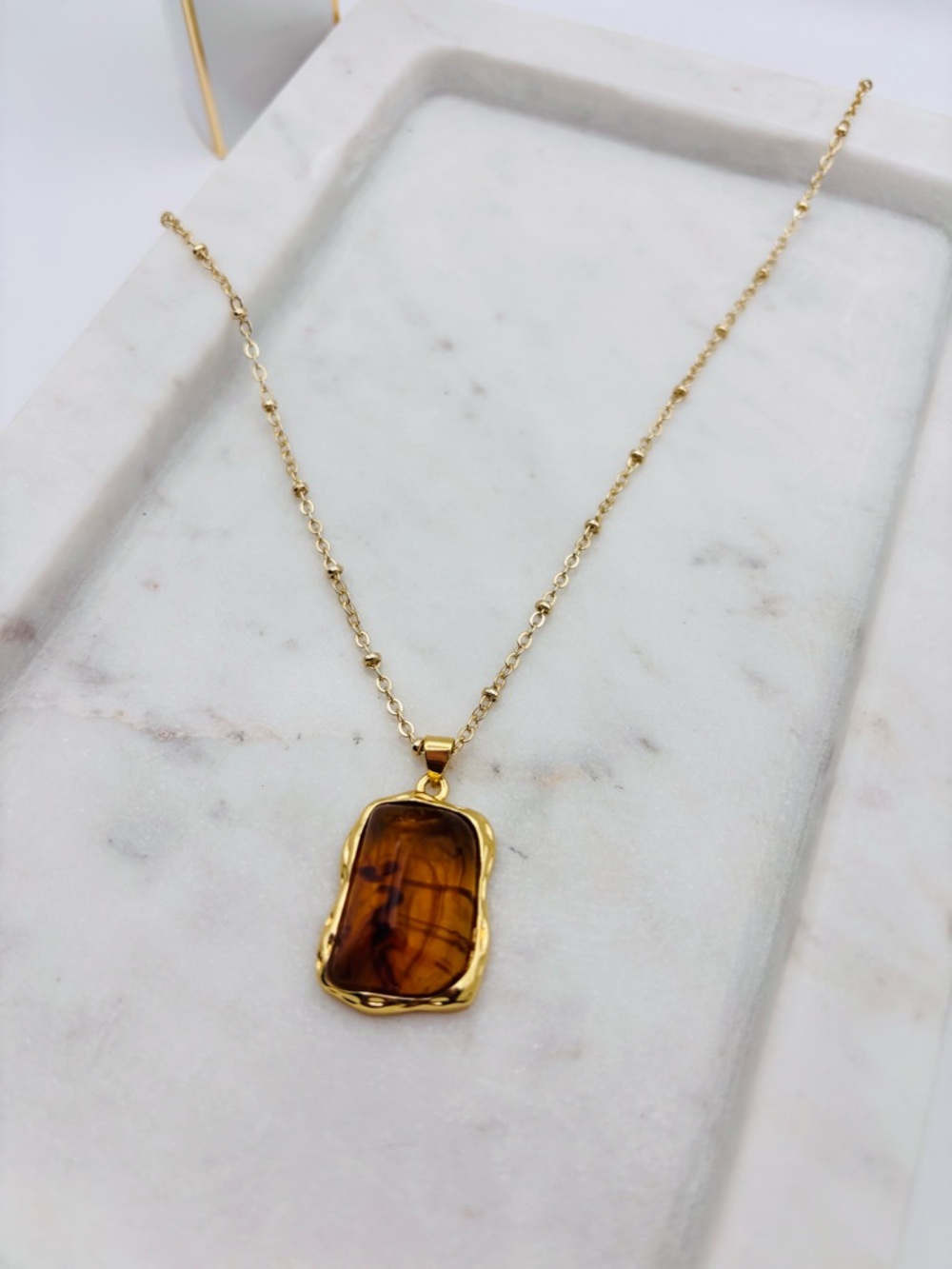 Gold-Tone Necklace with Amber-Colored Stone Pendant